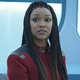 Michael Burnham sits in Starfleet HQ.